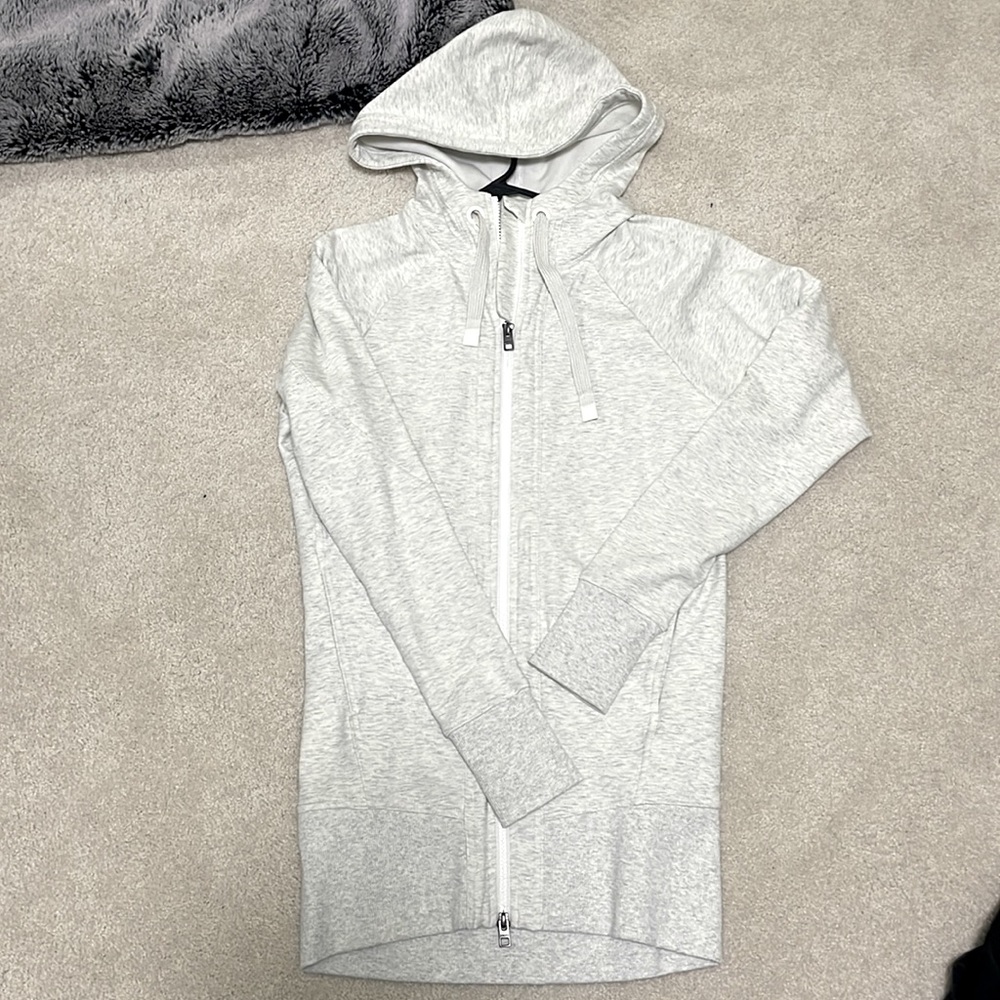Athletica zip up  jacket never worn. Size XXS